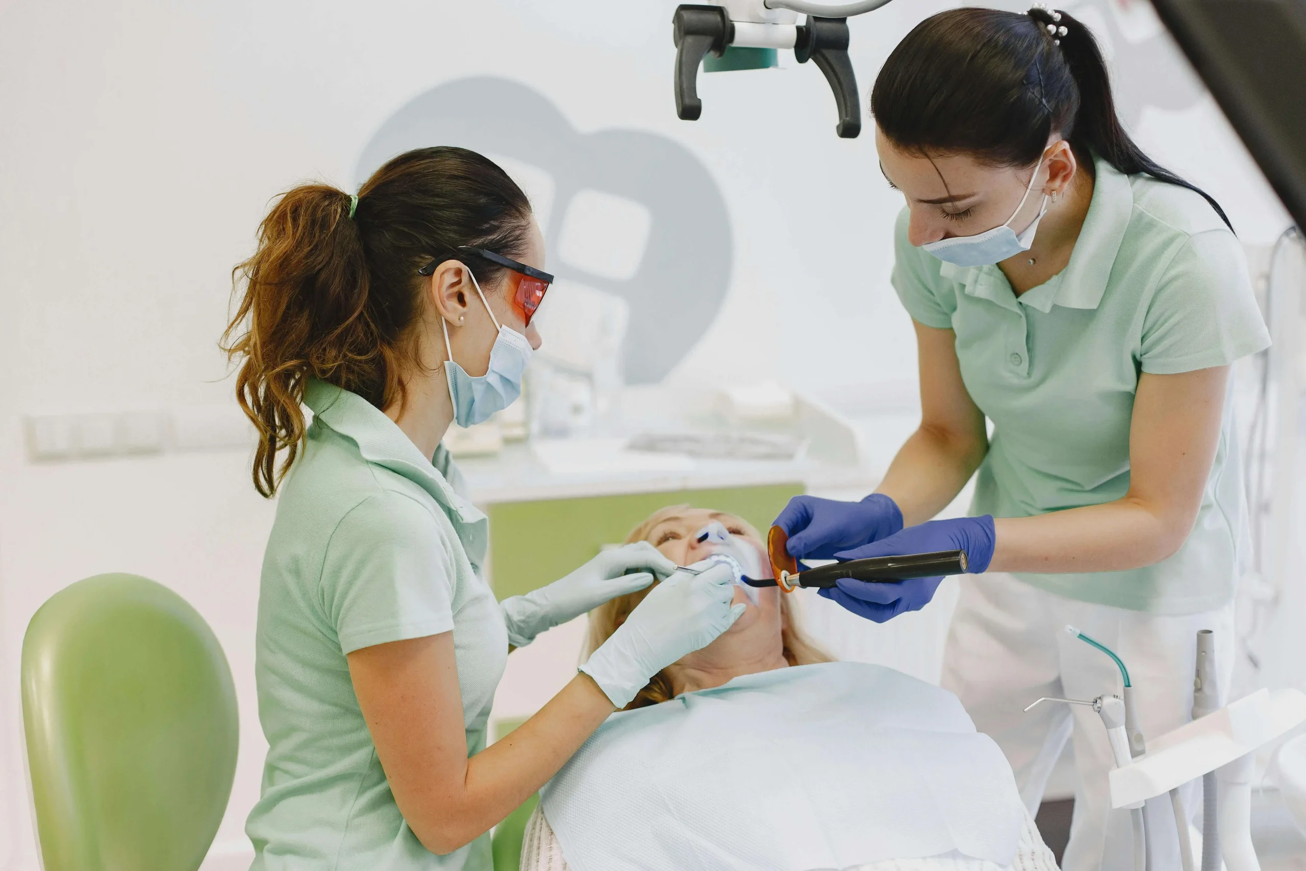 dentist treating a cavity Chinook mall family dental