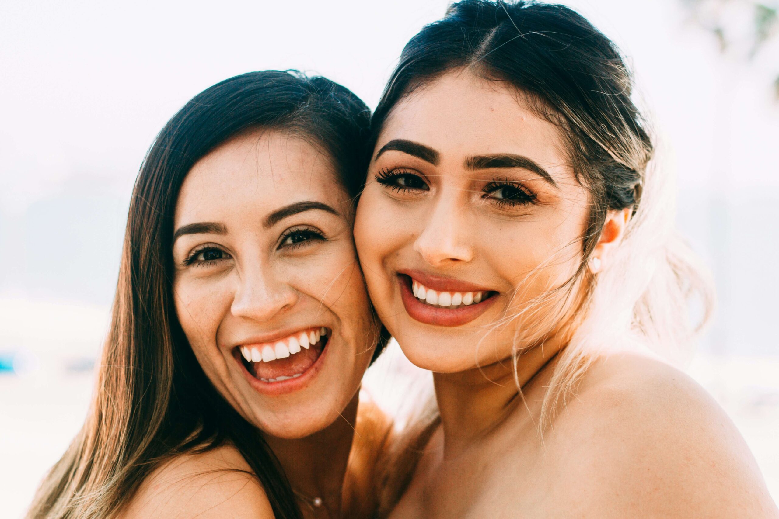 Women with white teeth smiling How to keep your teeth white Chinook dental Calgary
